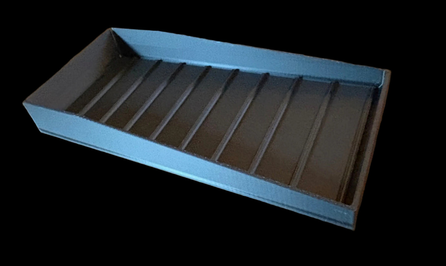 Black rectangular tray for tools like pliers